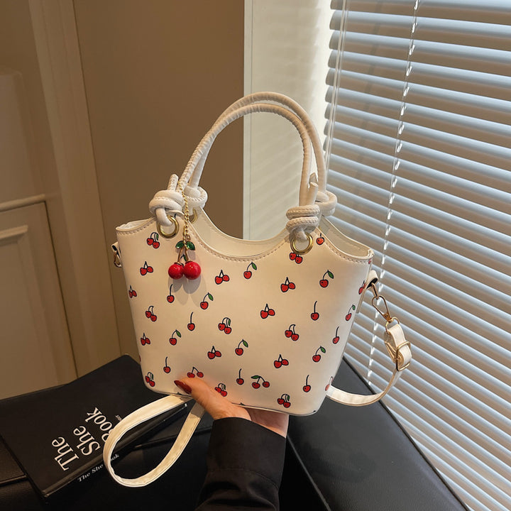 Damen Handtasche mit charmantem Kirschdesign und eleganten Details Nord Taschen