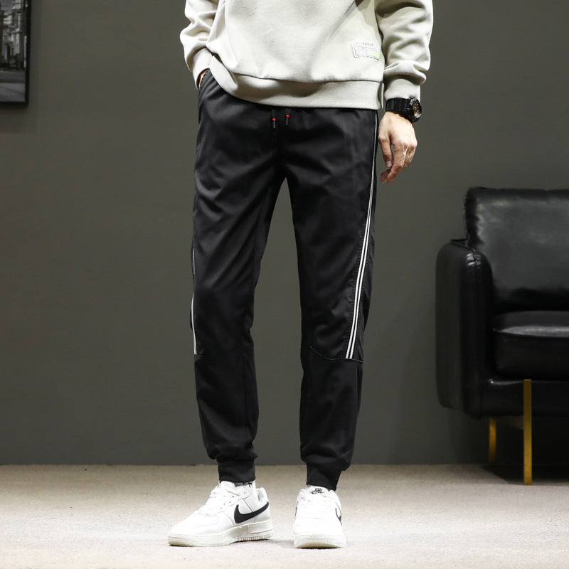 Herren Sportive Jogginghose im Trackstyle mit seitlichen Kontraststreifen, Tunnelzug und elastischen Bündchen Nord Taschen