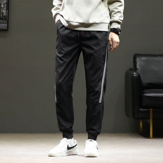 Herren Sportive Jogginghose im Trackstyle mit seitlichen Kontraststreifen, Tunnelzug und elastischen Bündchen Nord Taschen