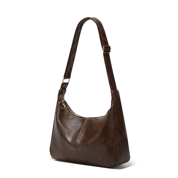 Damen Hobo-Handtasche mit weichem Kunstleder und elegantem Tragegurt Nord Taschen