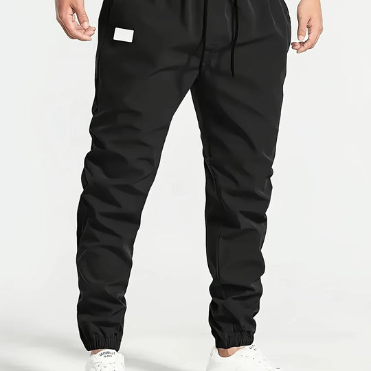 Herren Slim‑Tapered Tech‑Joggerhose mit Tunnelzugbund, elastischen Knöchelbündchen und funktionalen Seitentaschen Nord Taschen