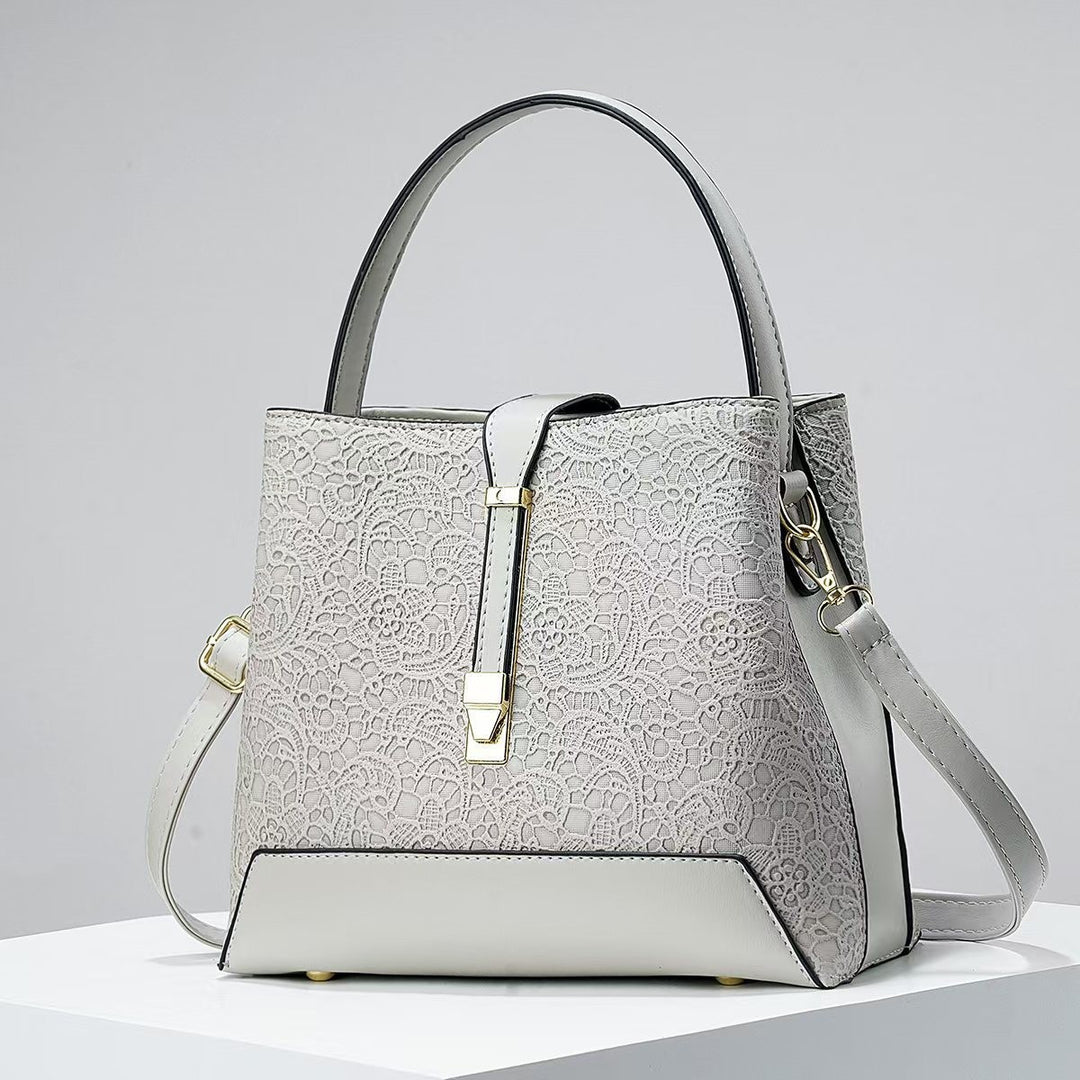 Damen elegante Handtasche mit filigranem Spitzenmuster Nord Taschen