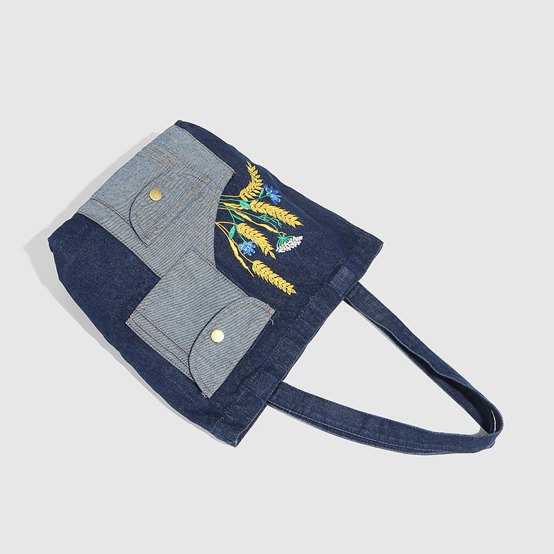 Damen Einkaufstasche mit floralem Stickmotiv und praktischen Außentaschen Nord Taschen