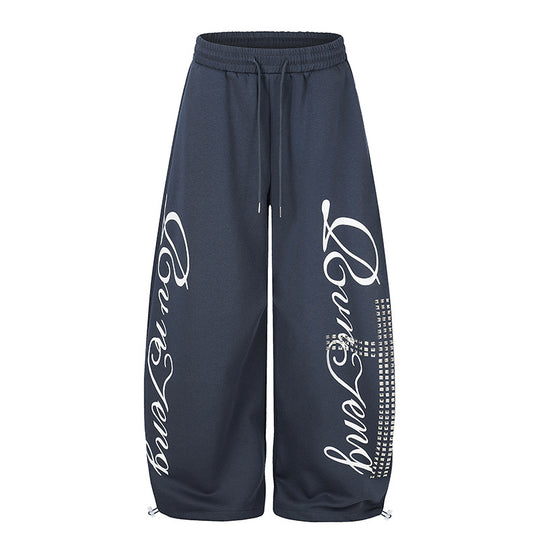 Damen Palazzo-Sweatpants im Culotte-Stil mit hohem Bund, Tunnelzug, Schriftprint und Strassbesatz Nord Taschen