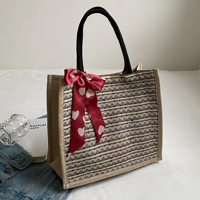 Damen Jute-Tasche mit buntem Muster und eleganter Schleife Nord Taschen