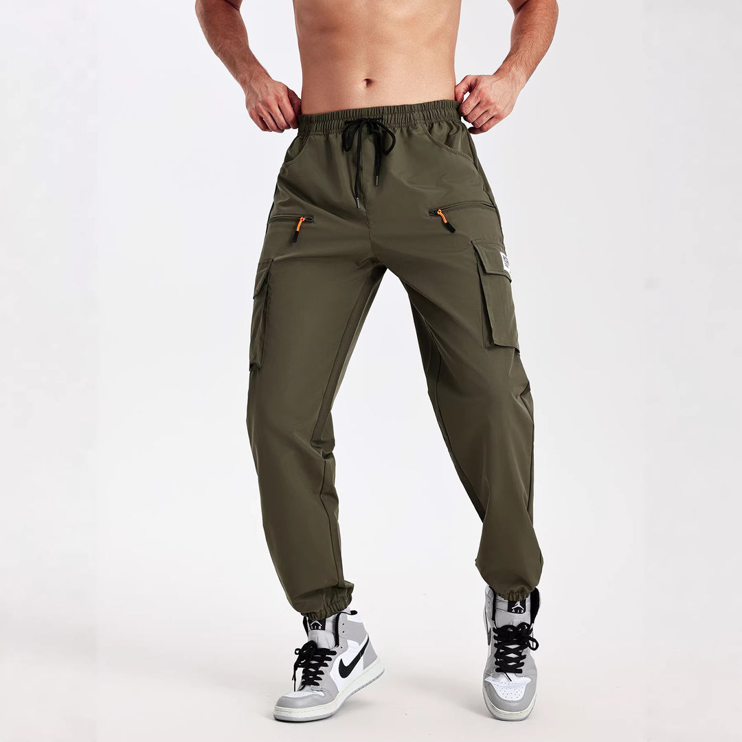 Herren konisch geschnittene Utility-Cargohose im Joggerstil mit Tunnelzugbund, Reißverschlusstaschen & elastischen Beinabschlüssen Nord Taschen