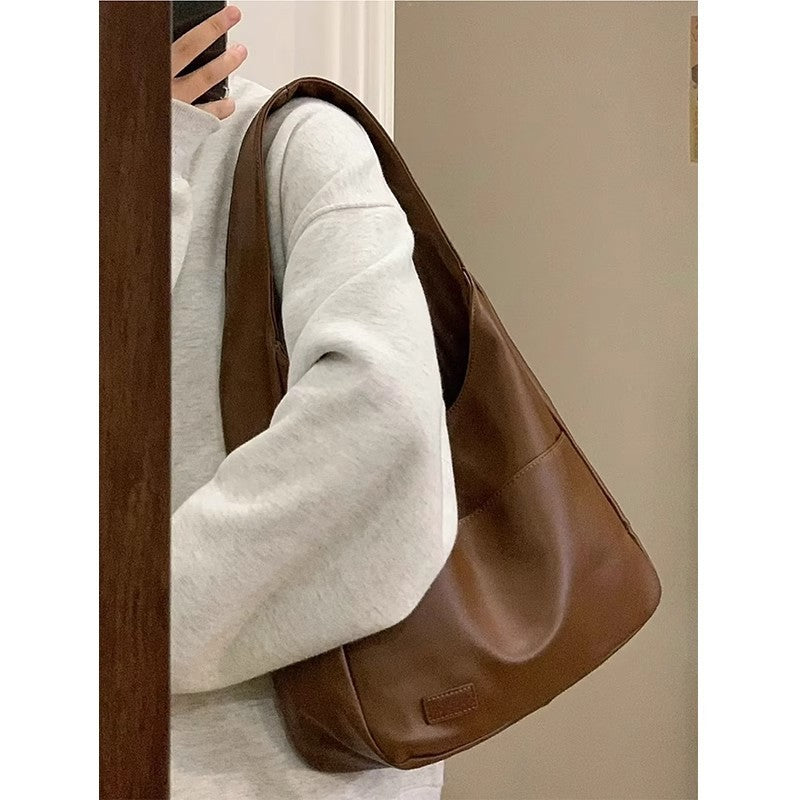 Damen Hobo-Tasche mit modernem, geschwungenem Design und schadstofffreiem Kunstleder Nord Taschen