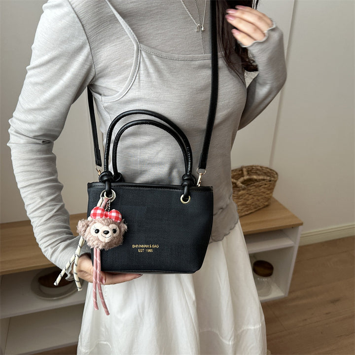 Damen Mini-Handtasche mit abnehmbarem Plüschtier-Anhänger Nord Taschen