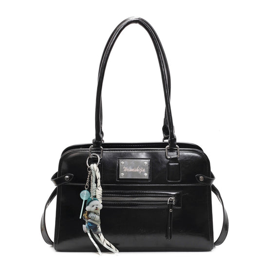 Damen Handtasche mit dekorativem Anhänger | Nord Taschen