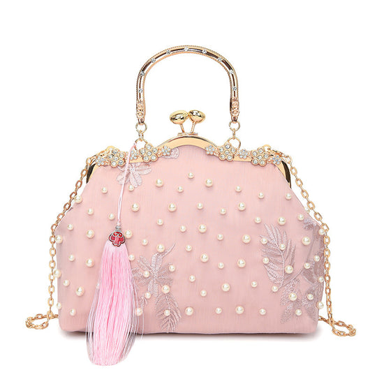 Damen elegante Handtasche mit perlenverziertem Design und Metallakzenten Nord Taschen