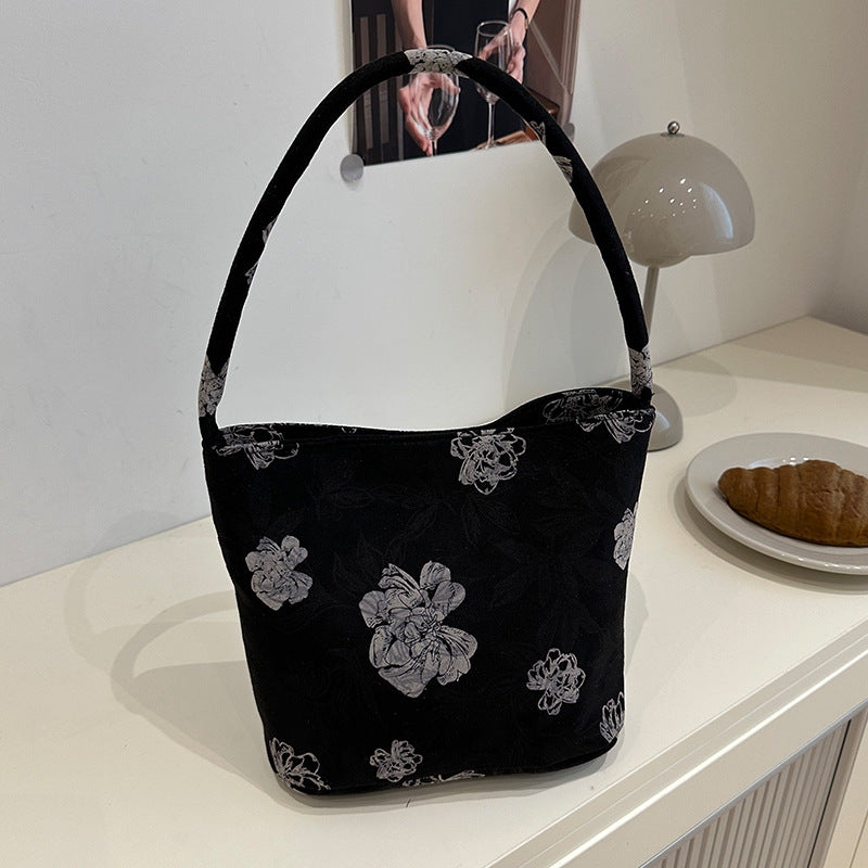 Damen Handtasche mit floralem Design und sanften Akzenten Nord Taschen
