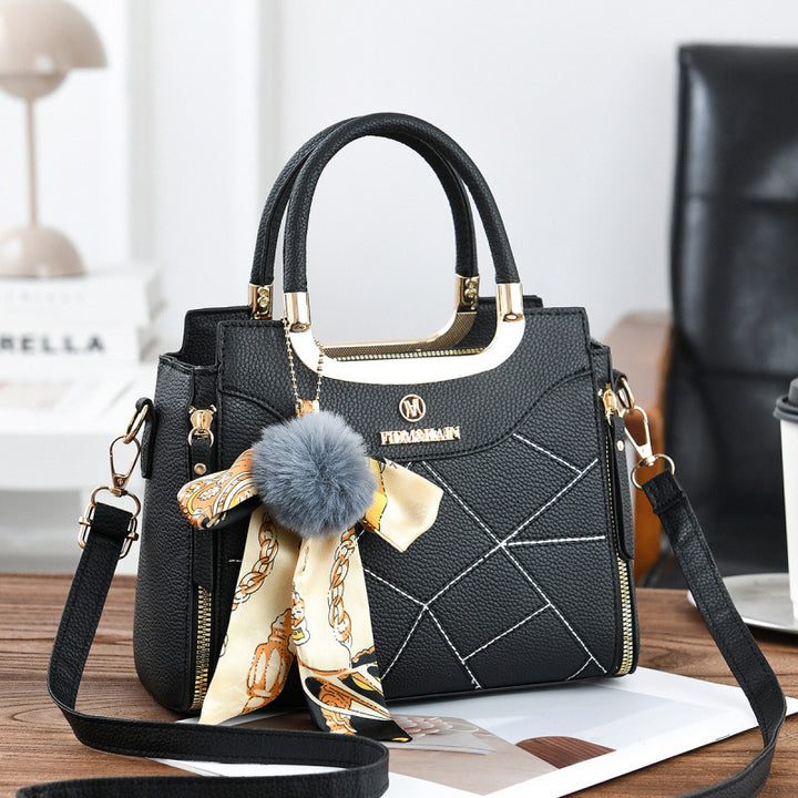 Damen elegante Handtasche mit abnehmbarem Schleifen-Anhänger Nord Taschen