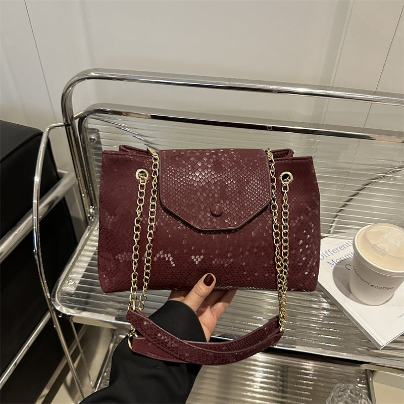 Damen elegante Umhängetasche mit schimmerndem Schlangenprägung Nord Taschen