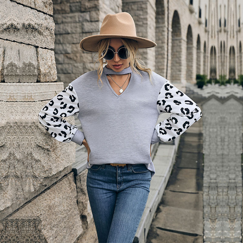Damen Lässiger Pullover mit Leopardenärmel Nord Taschen