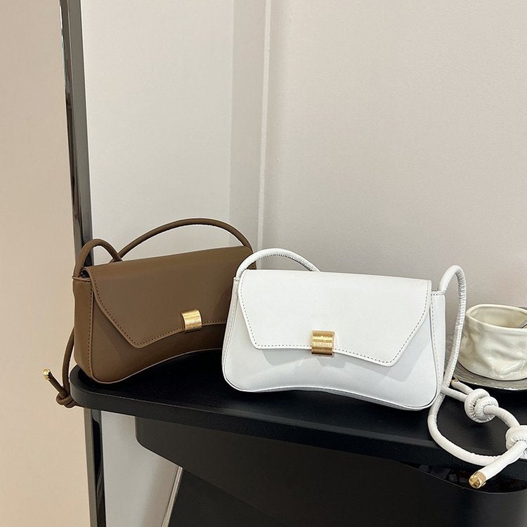 Damen Umhängetasche mit verstellbarem Tragegurt und eleganter Schnappverschluss Nord Taschen