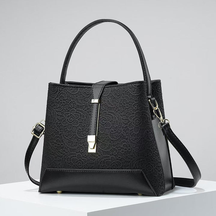 Damen elegante Handtasche mit filigranem Spitzenmuster Nord Taschen