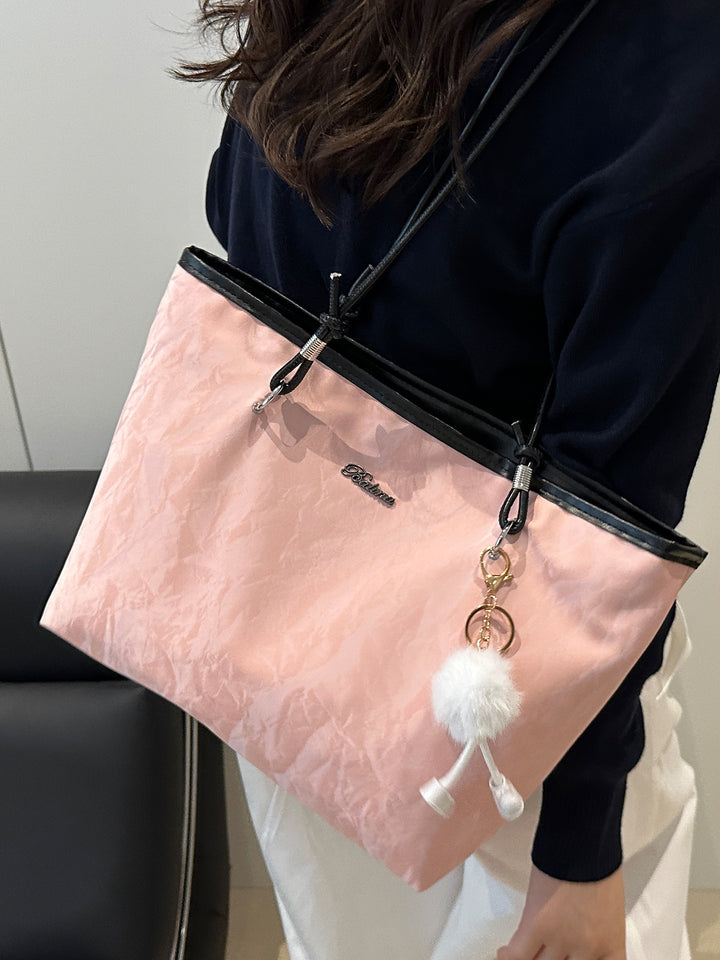 Damen modische Tragetasche mit gefaltetem Obermaterial und verspieltem Anhänger Nord Taschen