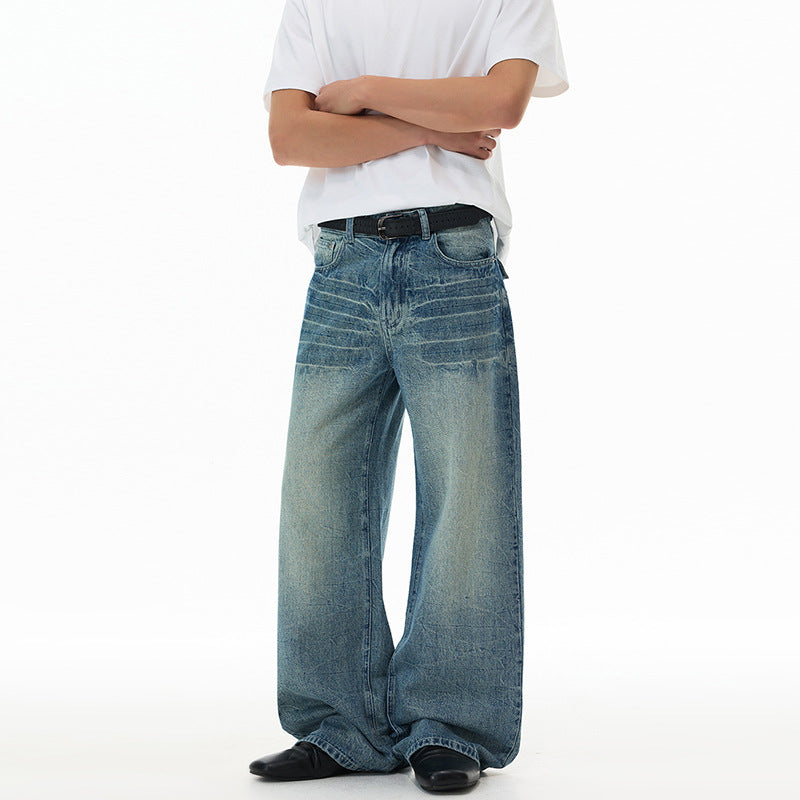 Herren Ultraweit geschnittene Denim-Baggy-Jeans mit markanten Whisker-Akzenten und bodenlangem Saum Nord Taschen