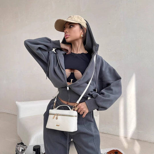 Damen kurzes Kapuzen-Sweatjacke mit Balloonärmeln und elastischer High-Waist Palazzo-Freizeithose Nord Taschen