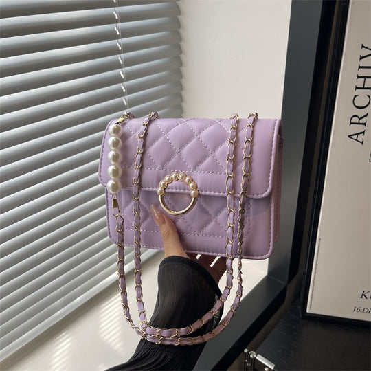 Damen elegante Handtasche mit strukturiertem Design und femininen Perlenakzenten Nord Taschen