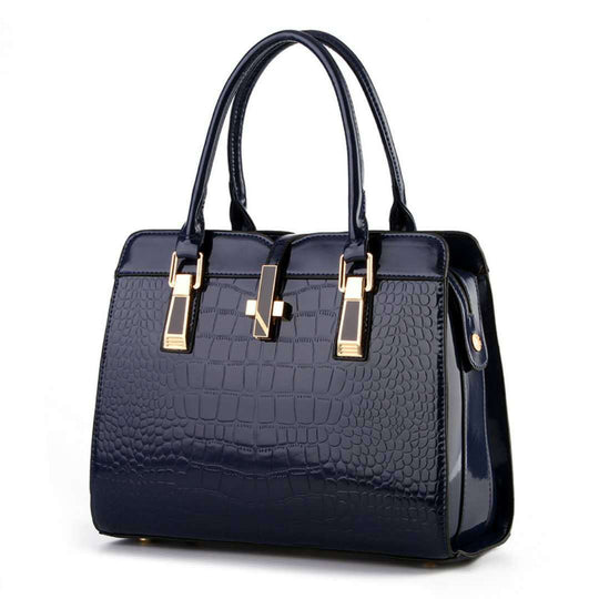 Damen Handtasche mit luxuriösem Krokodilleder-Look und goldenen Akzenten Nord Taschen