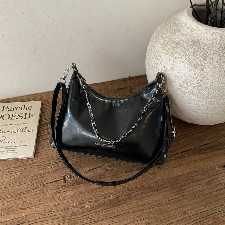 Damen Umhängetasche mit luxuriösem, poliertem Kunstleder und vielseitigem Tragegurt Nord Taschen