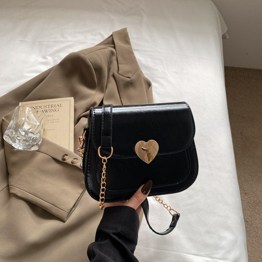 Damen elegante Umhängetasche mit Herzverschluss Nord Taschen