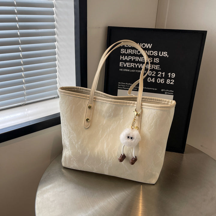 Damen-Handtasche mit hochwertiger Textur und verspieltem Charme Nord Taschen