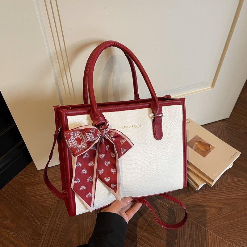 Damen stilvolle Handtasche mit dekorativem Schleifendetail Nord Taschen