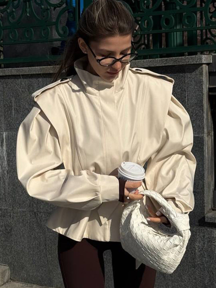 Damen Taillierte Peplumjacke mit Bindegürtel und voluminösen Ärmeln Nord Taschen