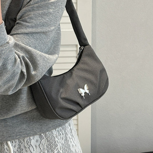 Damen Handtasche mit kreativer Faltentechnik und verspieltem Trageriemen Nord Taschen