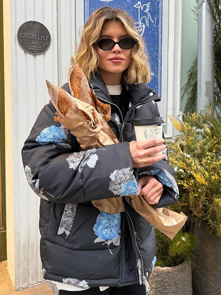 Damen Gepolsterte Oversize-Steppjacke mit Blumenprint und Kapuze Nord Taschen