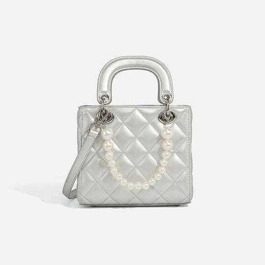 Damen Mini-Handtasche mit perlenverzierter Kette und quiltetem Design Nord Taschen