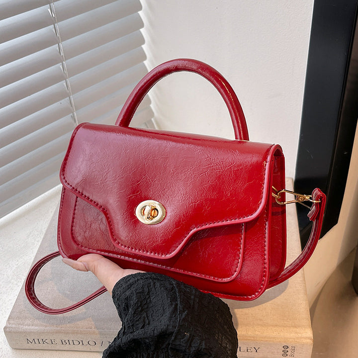 Damen Handtasche mit hochwertigem Kunstleder und elegantem Klappenverschluss Nord Taschen