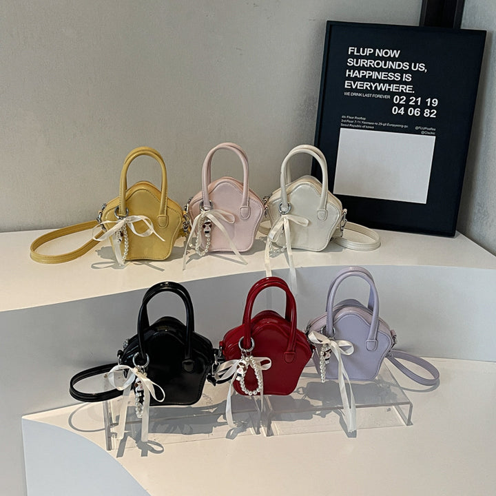 Damen modische Handtasche mit verspieltem Anhänger Nord Taschen