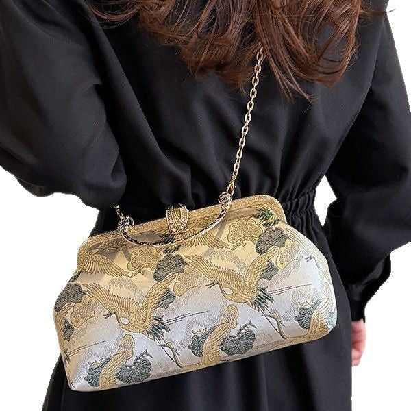 Damen Clutch mit filigranem Vogel-Motiv Nord Taschen