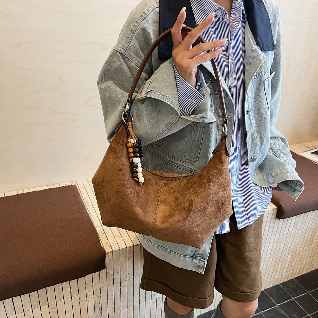 Damen Schultertasche mit eleganter Wildleder-Oberfläche Nord Taschen