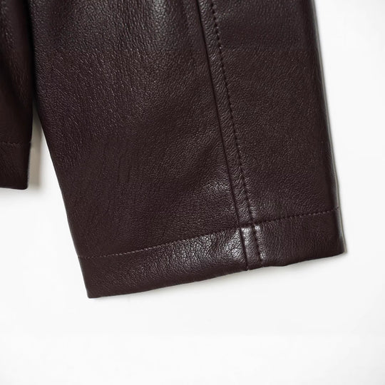 Damen Kurzjacke in veganer Lederoptik mit taillierendem Tunnelzug und Pattentaschen Nord Taschen