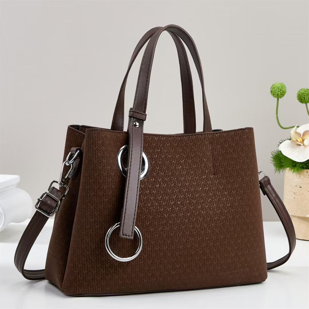 Damen Handtasche mit strukturiertem Design und eleganten Ringdetails Nord Taschen