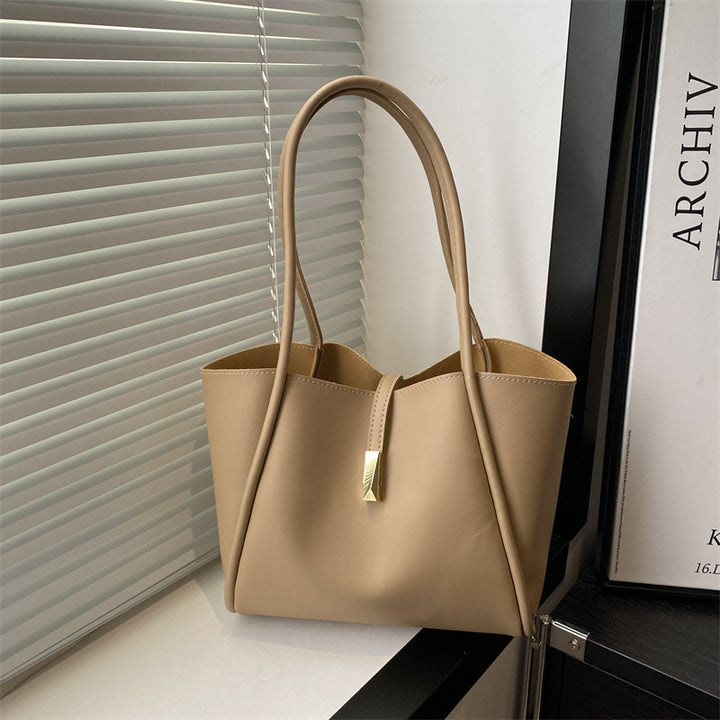Damen elegante Tragetasche mit goldenen Akzenten Nord Taschen