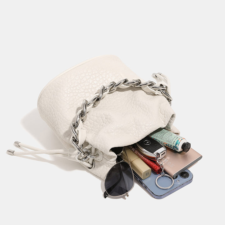 Damen Mini-Rucksacktasche mit elegantem Kettenhenkel und feiner Textur Nord Taschen