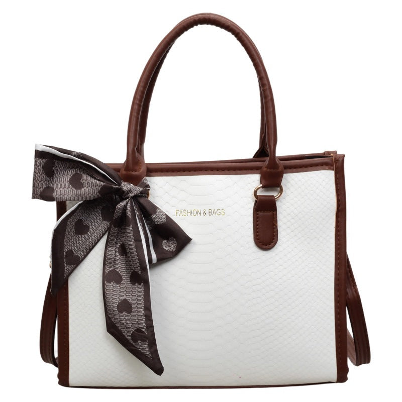 Damen stilvolle Handtasche mit dekorativem Schleifendetail Nord Taschen