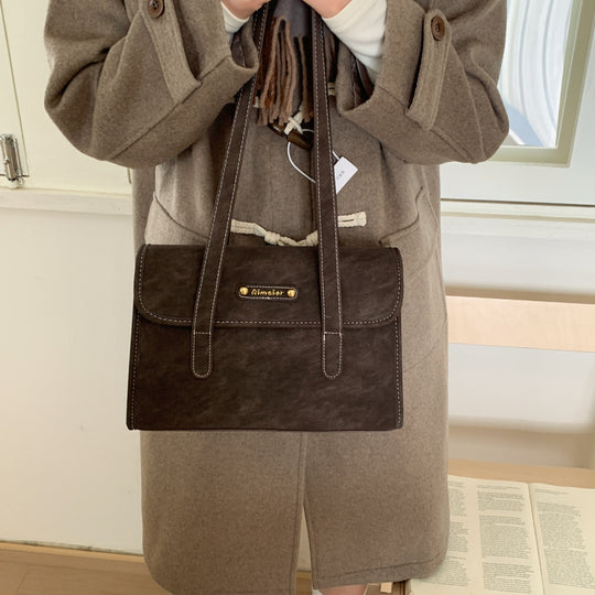 Damen modische Handtasche im charmanten Lederlook mit abnehmbarem Anhänger Nord Taschen