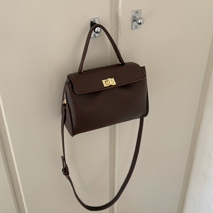 Damen elegante Handtasche mit strukturierter Oberfläche und goldfarbenem Schnallenverschluss Nord Taschen