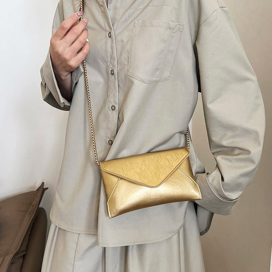 Damen Umhängetasche aus hochwertigem Kunstleder mit elegantem Kettenriemen Nord Taschen
