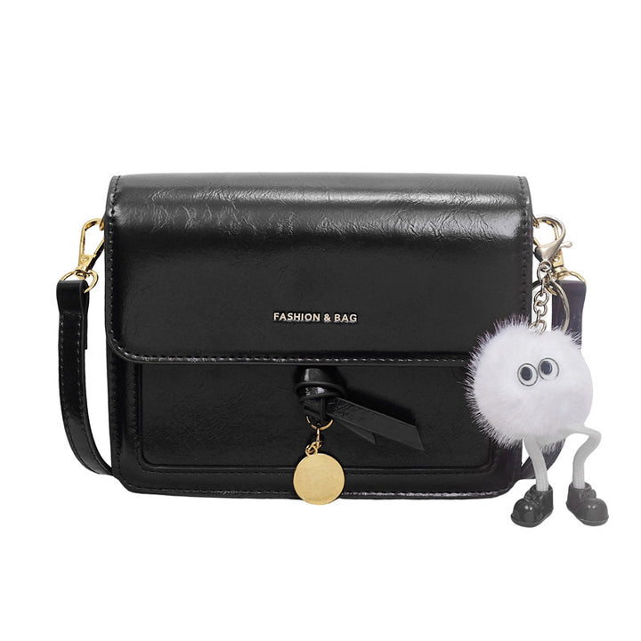 Damen Umhängetasche mit verspieltem Anhänger und elegantem Design Nord Taschen