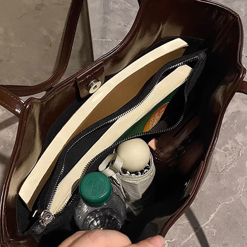 Damen Einkaufstasche mit eleganter geschwungener Form und hochwertiger Oberflächenstruktur Nord Taschen