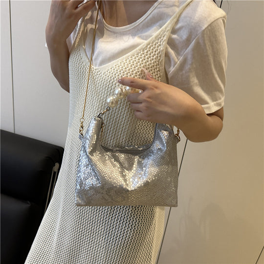 Damen Umhängetasche mit Perlenhenkel und eleganter Schlangenprägung Nord Taschen