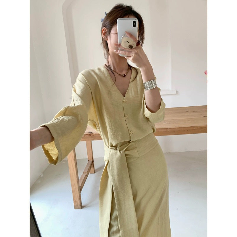 Damen Midikleid aus Leinenoptik mit tiefem V-Ausschnitt tailliertem Bindegürtel und dreiviertelärmeln Nord Taschen