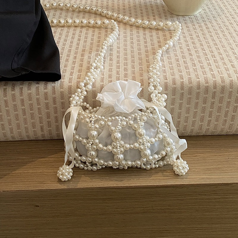 Damen Clutch mit Perlenakzenten und floralem Design Nord Taschen